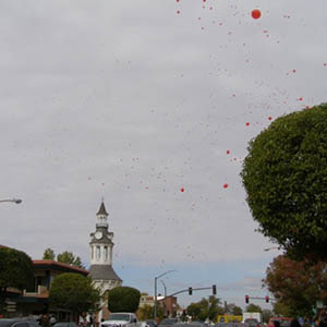 Red Ballons floating in air Balloon Release, Red Bluff, CA
